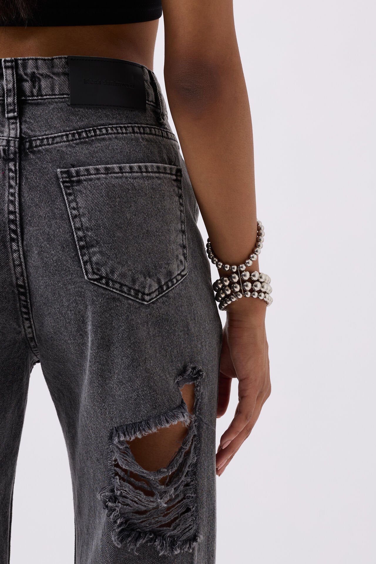 Wholesale Back Laser Cut Wide Leg Black Jeans
