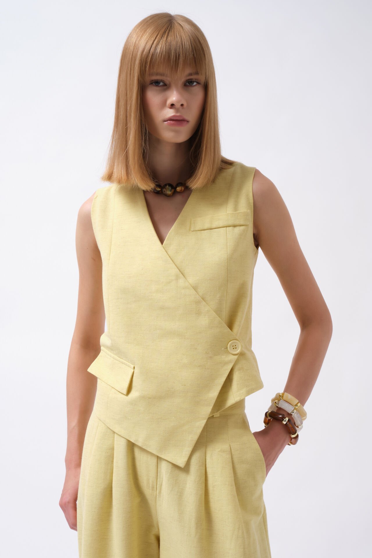 Wholesale Side Button Asymmetrical Yellow Vest