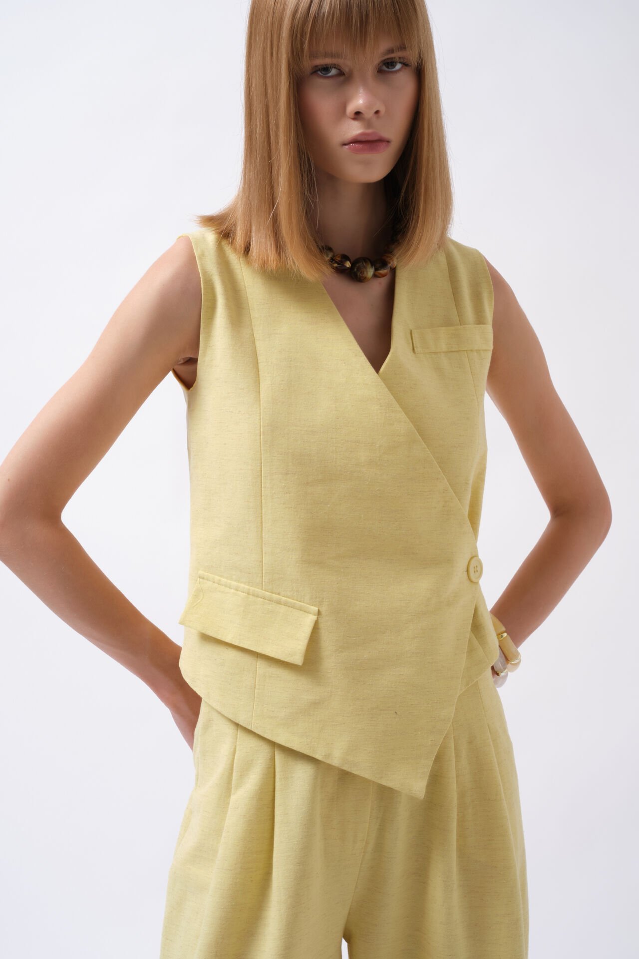 Wholesale Side Button Asymmetrical Yellow Vest