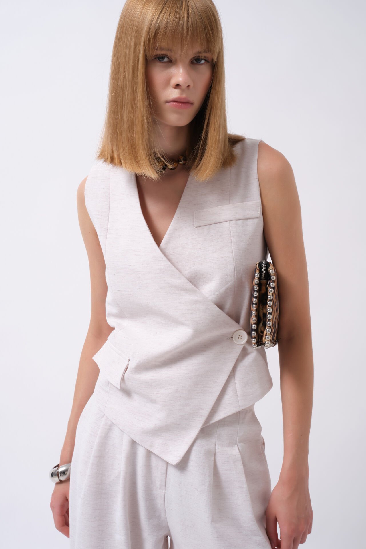 Wholesale Side Button Asymmetrical Beige Vest