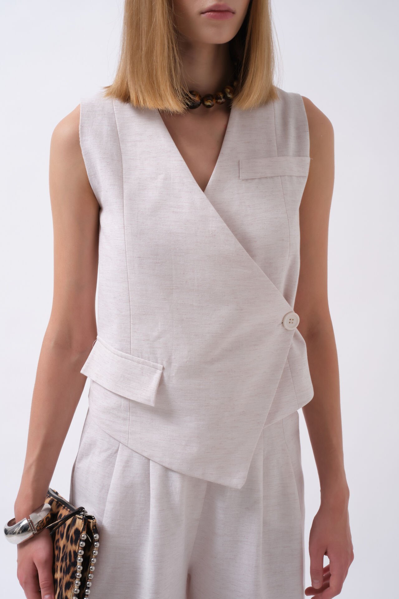 Wholesale Side Button Asymmetrical Beige Vest